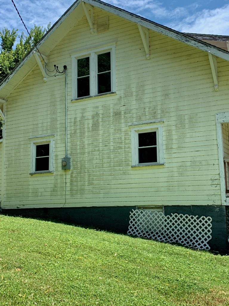 Yellow house with mold